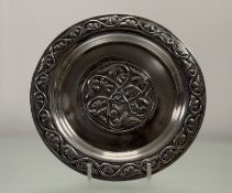 An Alexander Ritchie Edwardian Glasgow Arts and Crafts silver dish with scrolling leaf border and