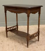 An Edwardian mahogany side table, moulded top over shaped apron, raised on turned supports united by