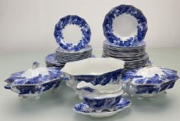 A Grindley and Co Argyle flow blue pattern dinner service comprising, a gavy boat and flat, eleven