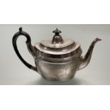 A George III Gustavus Byrne of Dublin silver tea pot of oval form with bright cut and floral