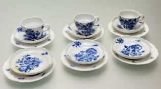 A Meissen blue and white onion fifteen piece part tea service decorated with tulip and floral sprays
