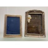 An Edwardian Birmingham silver arched photograph frame lacking easel stand to oak back: internal