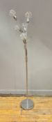 A contemporary chrome standard floor lamp light with five arms, each shade decorated with