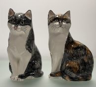A pair of Barbacombe Pottery Seated Cats one black and white the other brown, black and white. (h-