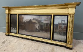 A Victorian giltwood overmantle mirror, with moulded top over tripartite inset plate mirrors to