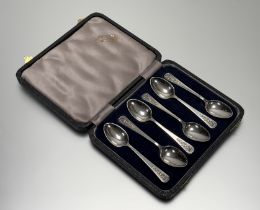 A set of six modern Sheffield silver celtic knot design handled tea spoons in original blue velvet-