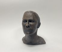 A contemporary studio work bust of a man, with 'KBW' verso, with bronzed effect (h. 30cm)