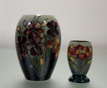 A Moorcroft Spring Flowers pattern vase (h-21cm) together with a smaller Moorcroft Spring Flower