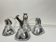 A pair of hinged twin theatre spotlights with chrome shades, untested (h. shades 23cm) (4)