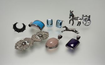 A collection of silver jewellery to include a oval rose quartz pendant: l. x 4.5cm, a turquoise