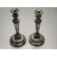 A 19thc Sheffield plated pair of weighted table candlesticks of tapered and fluted design on - Image 1 of 3
