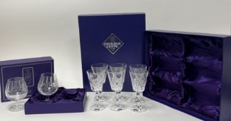 A boxed set of two Edinburgh Crystal brandy glasses with acid-etched Robert Burns busts and verses