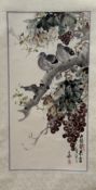 A 20thc Chinese School silk scroll depicting perched on a grape tree, watercolour on paper, with red