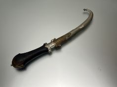 A Indonesian carved-handled curved blade dagger with cover (l. 43cm)