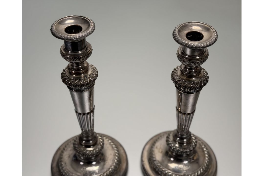 A 19thc Sheffield plated pair of weighted table candlesticks of tapered and fluted design on - Image 3 of 3