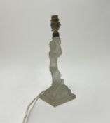 An Art Deco frosted glass figural lamp base in the form of a lady holding an urn (plugs removed) (h.