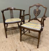 An Edwardian mahogany armchair, with arched top and neo-classical painted splat, scroll arms and