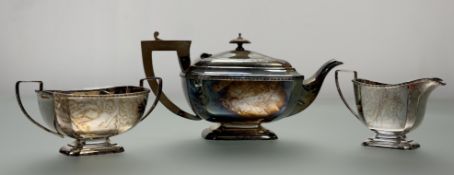 An epns three-piece tea service of panel side form comprising a two-handled sugar bowl, milk jug and