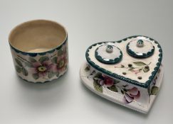 A Wemyss Iris pattern ink stand in heart form with double ink well and covers with glass inserts (
