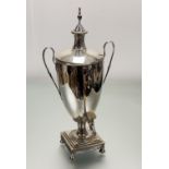 A 1920s Adam-style a two handled samovar with urn finial and plastic tap handle on square stepped