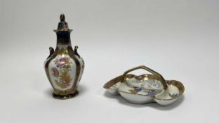 A Keeling & Co Losol Ware vase and cover in the Bourbon pattern, with twin handles to sides, printed