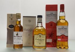 A bottle of Glenlivet Caribbean Reserve, a bottle of Dalwhinnie Highland Single Malt Scotch Whisky