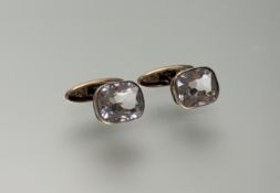 A pair of large 9ct gold-mounted rock crystal faceted sleeve links in rub over setting with snap
