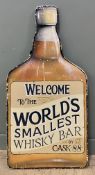 A 'World's Smallest Whisky Bar' wall sign, in the form of a hand-painted whisky bottle: h.x 122cm