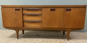 A mid-century teak sideboard, by Greaves and Thomas Model 5222, fitted three graduated drawers to
