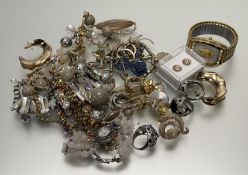A collection of costume jewellery to include two white metal panther paste set rings, a gilt metal