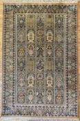 A modern hand-knotted Persian 'tree of life' rug, central field with thirty panels depicting