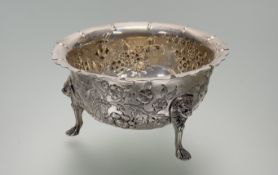 A Dublin Weir & Sons silver sugar bowl in the Georgian taste with scalloped border and all over