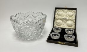 A case containing four crystal slice cut butter dishes in original fitted case retailed by Robert