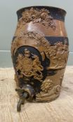 A 19th century stoneware salt glazed rum dispenser, featuring the Royal coat of arms and 'RUM' to