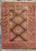 A 1920s Caucasian/ Kazak rug, central panel with large repeating gul motifs enclosed within