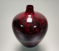 A Royal Doulton Flambe Woodcut 1616 red bulbous vase, marked verso. (h-22cm)