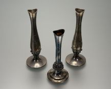 A Dublin silver celtic chased individual bud vase of flared form on circular base: h. x 14.5cm