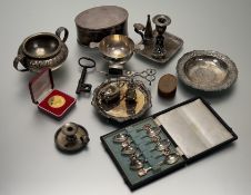 A collection of white metal, silver and epns to include an Eastern white metal chased shallow dish