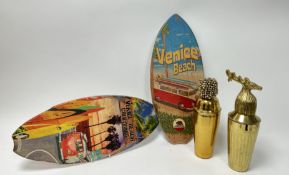 A pair of handmade Venice Beach Clalifornia wooden souvenir surfboards decorated with similar VW red