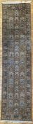A modern hand-knotted Persian 'tree of life' runner, central field with forty eight panels featuring