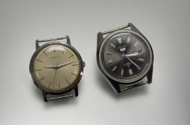 A Vintage Corum stainless steel gilt dial manual wind wristwatch with baron hour markers with