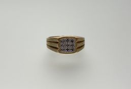 A Canadian 10t gold ring set with three rows of three diamond points size 3/4 6.85g