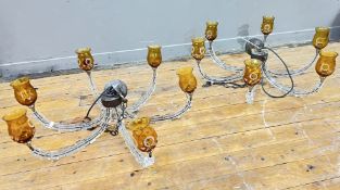 A pair of mid-20thc six-arm chandeliers with articulated acrylic arms and a central metal mount,