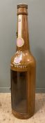 A large modern Jameson Whiskey advertising bottle, ash wood with painted front, with small curved