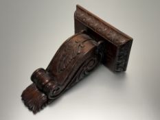 A 19thc Oak canthus carved wall bracket, with rectangular top. (h-39cm l-30.5cm)