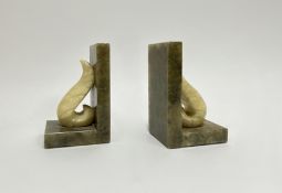A pair of Italian carved alabaster book ends with feather motif decoration (paper label verso, h-
