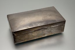 A George V Birmingham silver rectangular cigarette box with cedar lined interior: h. x 9.3cm l. x