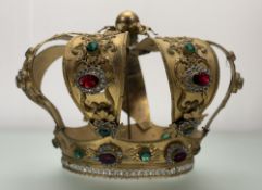 A Royal Crown with open work gilt metal and highly decorated with adorned red and green paste gems