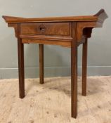 A modern cherry wood Chinese-style side table, moulded top with curved edges to sides, over