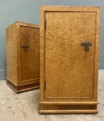 A pair of 1930s Art Deco birdseye maple veneered bedside cabinets, with walnut banding to top over